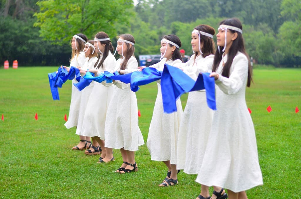 Buryat Heritage Chicago community members at a cultural gathering outdoors.
